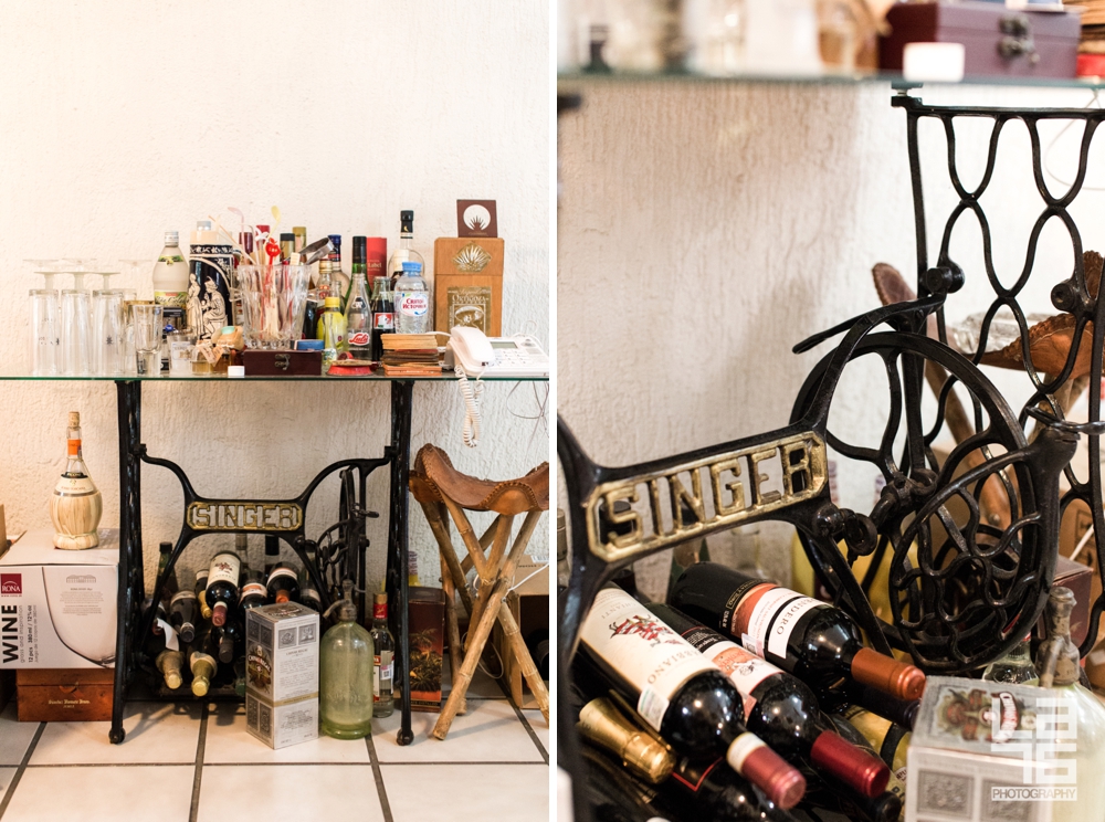 Singer's sewing table converted into a liquor bar. 